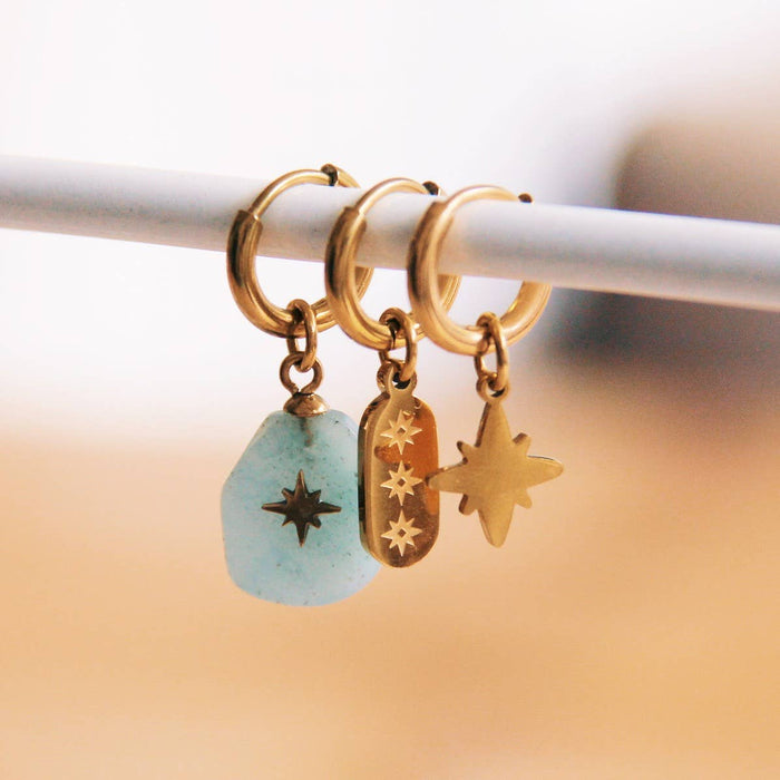 Creolen van roestvrij staal met label en sterren — goud