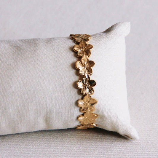 Gouden armband met bloemen