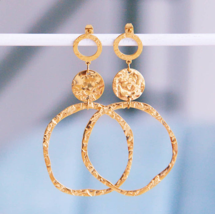 Statement oorbel ronde gehamerde ringen